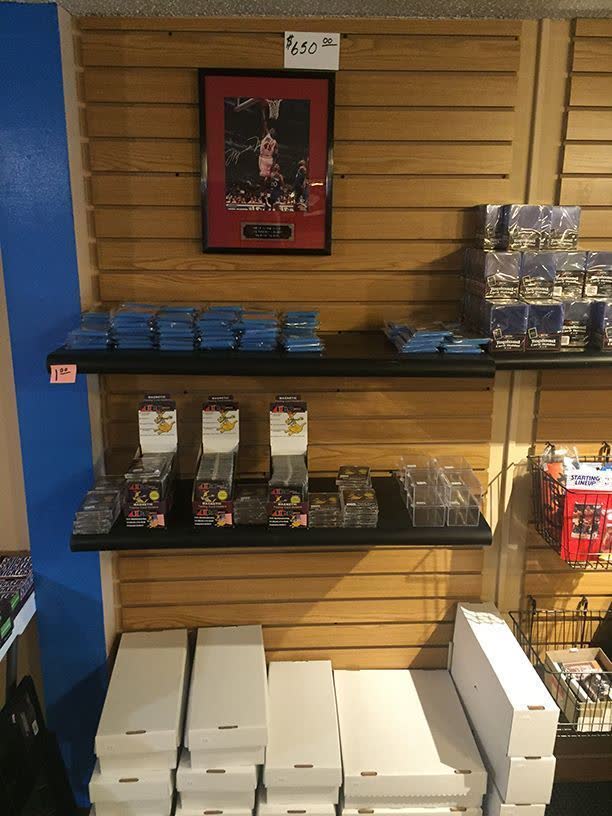 Framed autographed Michael Jordan photo on the display wall at Absolute Sports Cards