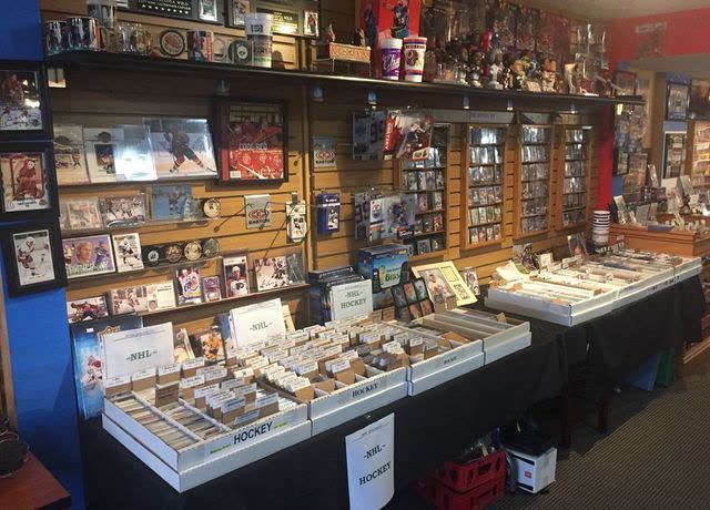 Wall of hockey cards and memorabilia
